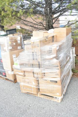 Pallet of assorted new scratch and dent items including planetary gear, beer mugs, glasses, platters, wrapped in plastic.