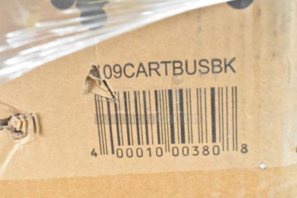 Close-up of a cardboard box with barcode 400010003808 and the code "09CARTBUSBK" marked on the side.