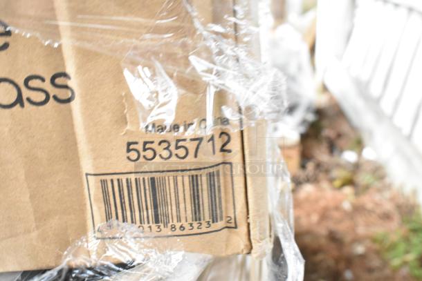 Cardboard box with barcode 5535712, partially wrapped in plastic, indicating contents made in China.