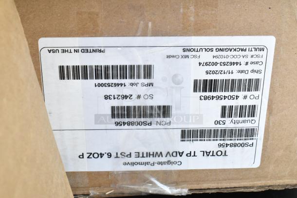 Cardboard box with shipping label showing barcodes and product codes. Contains a mixed lot of 35 new scratch and dent items.