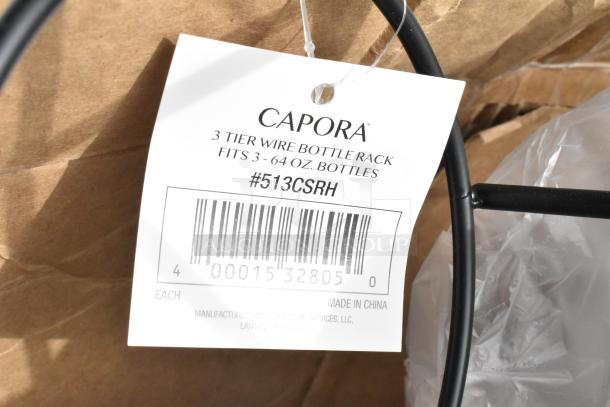 Capora 3-tier wire bottle rack tag, fits three 64 oz bottles, model #513CSRH, made in China, scratch and dent condition.
