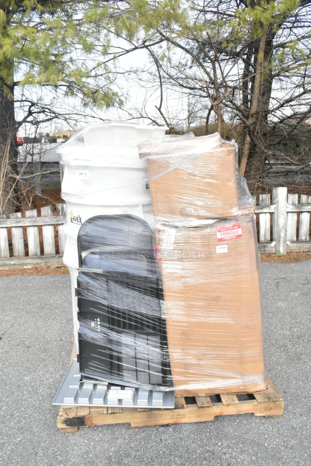 Pallet of 26 brand new scratch and dent items, including barstool cushion, pizza pans, tumblers, and fryer basket, wrapped and labeled.