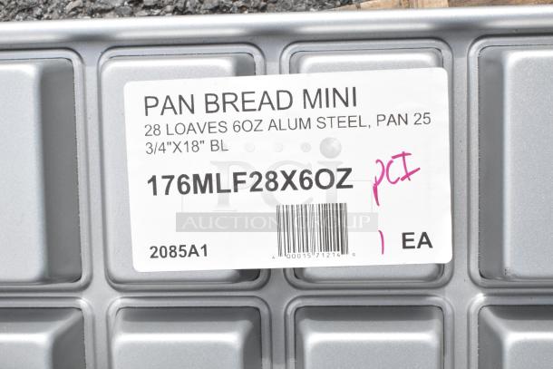 Close-up of a mini bread pan label, indicating 28 loaf capacity, 6oz aluminum steel, measuring 25 3/4"x18". Model: 176MLF28X6OZ.