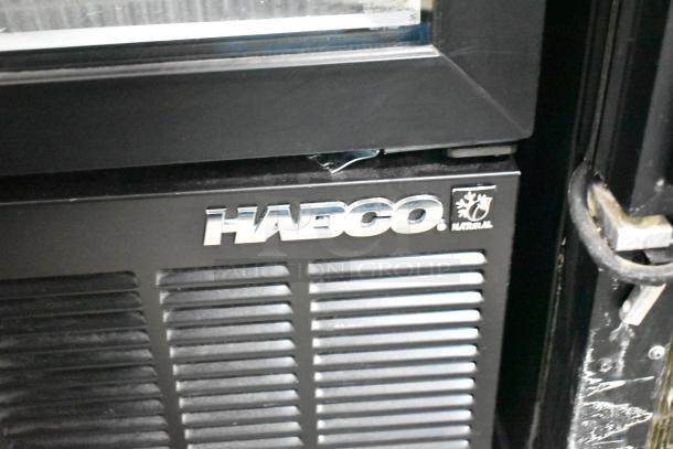 2019 Habco SE18HC Commercial Cooler, single door, 115V, visible logo, black finish, good condition.