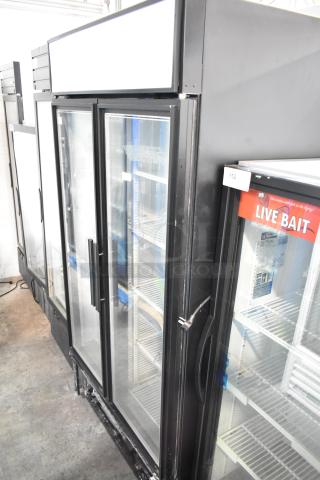 True GDM-35F-LD commercial freezer merchandiser, two glass doors, 115 volts, 1 phase, in good condition.