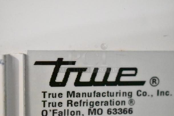 True GDM-35F-LD freezer label, showing manufacturer details: True Manufacturing Co., O'Fallon, MO.