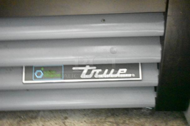 2023 True GDM-12-HC commercial cooler with visible brand label, 115 volts, 1 phase, excellent condition.