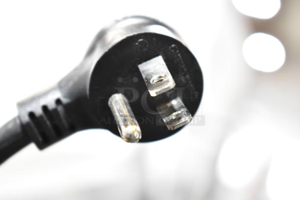 Close-up image of a power cable plug for the 2023 True GDM-12-HC cooler, 115 volts, 1 phase.