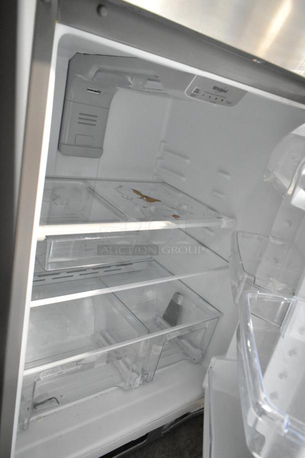 Whirlpool WRT311FZDM01 reach-in cooler with freezer, 115 volts, 1 phase, clean interior, visible shelving.