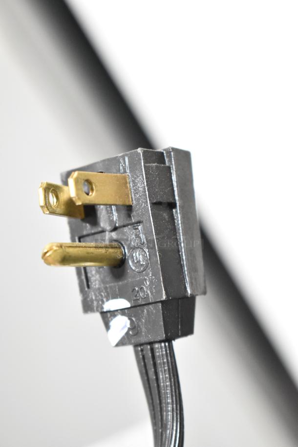 Close-up of a power plug for Whirlpool WRT311FZDM01 Reach In Cooler, 115 Volts, 1 Phase.