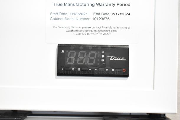 2021 True TSCI-600R-G-PH cooler control panel, warranty until 02/2024, showing digital display and settings.