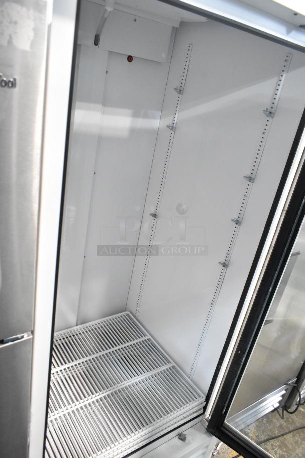 2021 True TSCI-600R-G-PH commercial single door reach-in cooler, 115V, excellent condition, white interior with shelving.