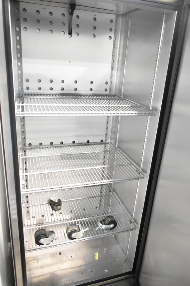 2016 True T-19F commercial single door freezer, reach-in design, features four wire shelves, 115 volts, 1 phase, used condition.