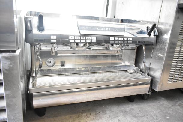Nuova Simonelli Aurelia II espresso machine, 2 groups, 2 steam wands, commercial use, 208-220 volts, 1 phase, good condition.