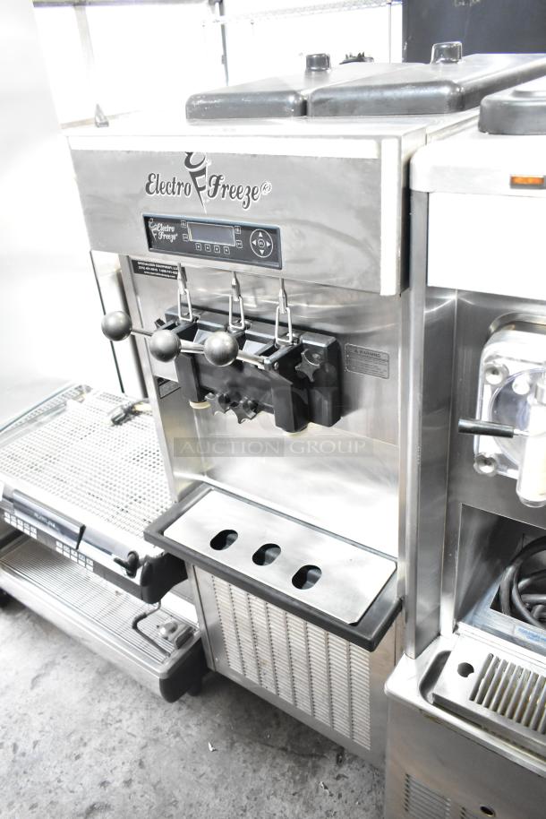Electro Freeze SLX400E-137 soft serve ice cream machine, 2 flavor w/ twist, water-cooled, 208-230V, commercial casters.