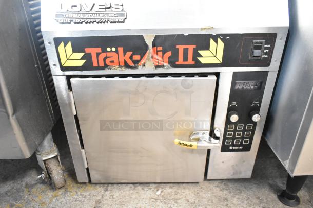 Trak-Air TAEMC-II greaseless fryer, commercial model, 120 volts, digital controls, minor wear marks, sturdy condition.