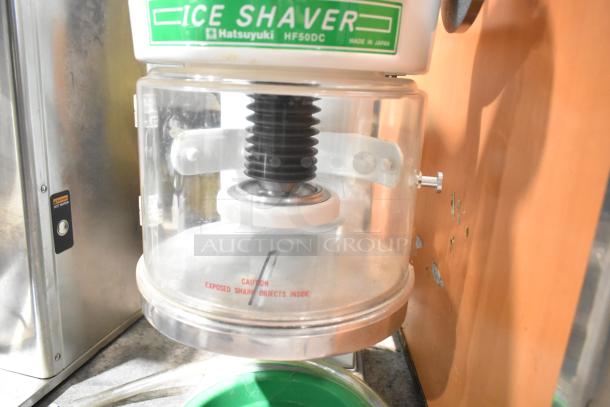 Hatsuyuki HF50DC commercial countertop ice shaver, model HF50DC, with clear chamber and warning label. Made in Japan.