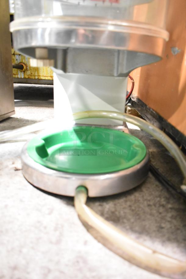 Hatsuyuki HF50DC commercial ice shaver, countertop model, visible green drip tray, and attached hose.