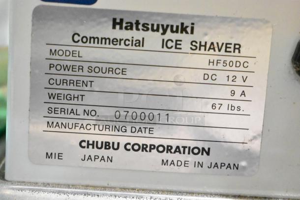 Hatsuyuki HF50DC commercial ice shaver label, detailing model, power, current, weight, serial number, and made in Japan by Chubu Corporation.