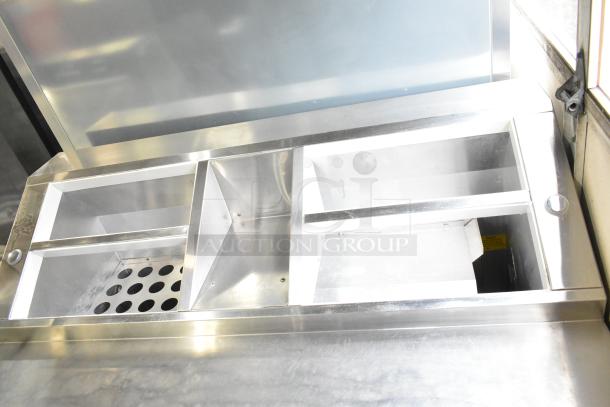 Norlake ZR122SMS/0-2 commercial prep table, stainless steel with compartments visible, 115 volts, 1 phase.