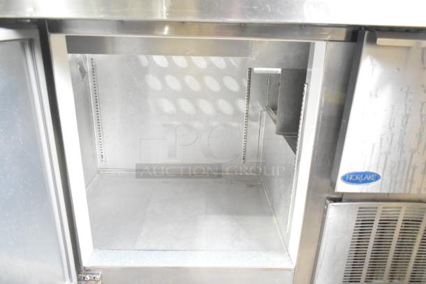 Norlake ZR122SMS/0-2 commercial prep table, stainless steel, 115V, 1 phase, open compartment, Norlake logo visible.