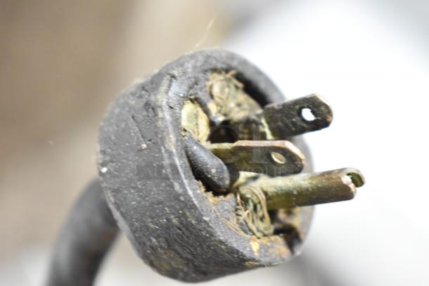 Close-up of a worn electrical plug from a Hobart A200 Commercial 20 Quart Planetary Dough Mixer. Condition shows wear.