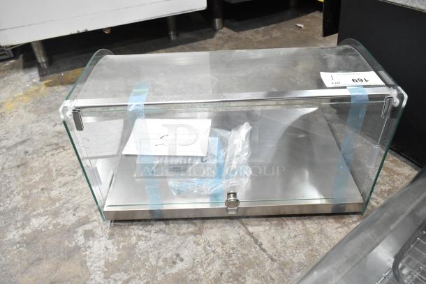 Brand new KoolMore DC-1C bakery display case, 0.9 cu. ft., with front curved glass and rear door, scratch and dent condition.