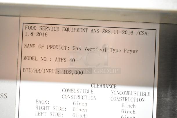 Cook Rite ATFS-40 gas fryer label, 102,000 BTU, commercial floor model, suitable for food service, clearance guidelines shown.