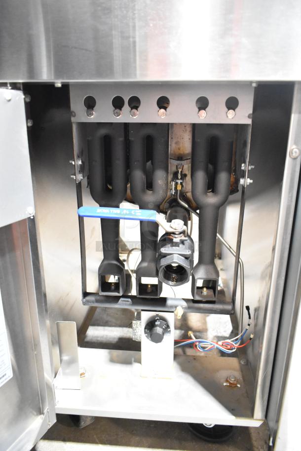 Cook Rite ATFS-40 commercial gas fryer, showing interior heating elements, 102,000 BTU, excellent condition, control knob visible.