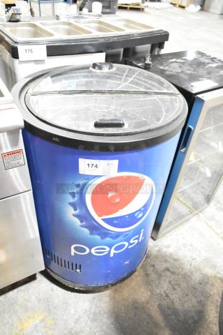 IDW G-77-N23EB commercial drink cooler, Pepsi branding, 120 volts, 1 phase, cylindrical design, auction tag visible.
