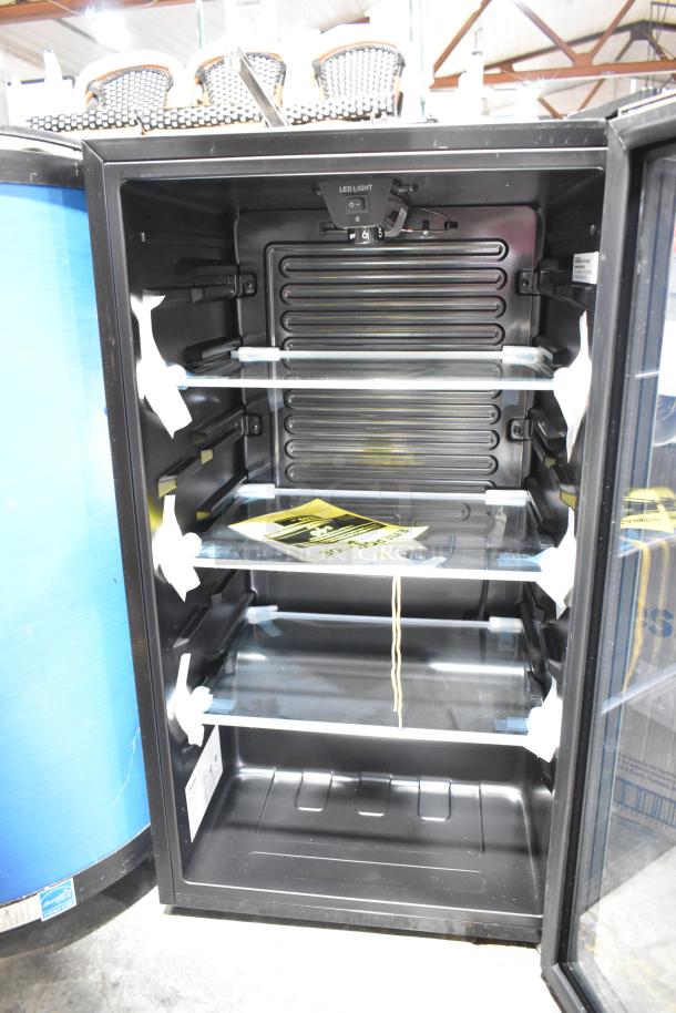 Brand new Midea MRV115S1BST 3.3 cu.ft. mini beverage cooler merchandiser. Scratch and dent condition, 115 volts.