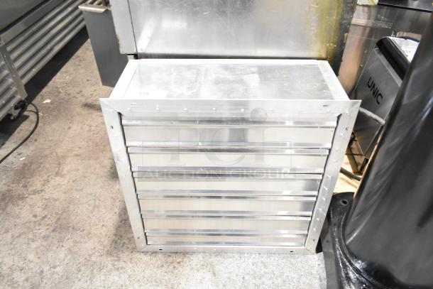 Aluminum vent with five horizontal slats, item number 178. Appears in good condition, industrial setting.