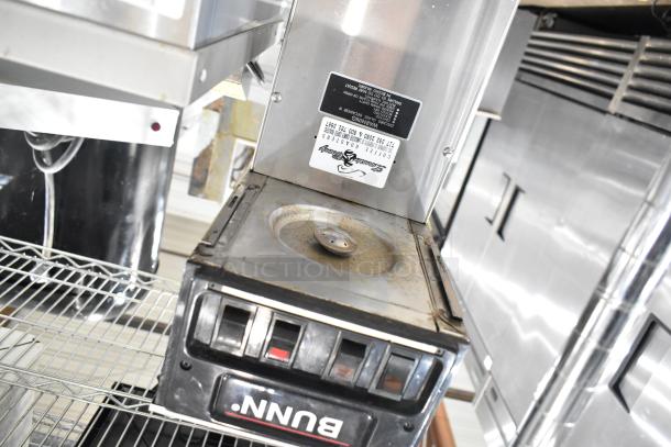 Bunn Commercial 3 Burner Coffee Machine, 115 Volts, 1 Phase. Visible wear on burner surface, labeled Bunn.