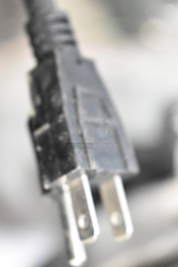 Close-up of a plug for the AvaToast 184T140 commercial conveyor toaster, 120 volts, model 2022.