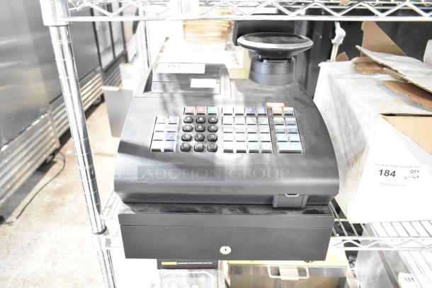 Royal alpha 7000ML electronic cash register, 115 volts, 1 phase. Features multi-colored keypad, in good condition.