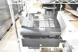 Royal alpha 7000ML electronic cash register, 115 volts, 1 phase. Features multi-colored keypad, in good condition.