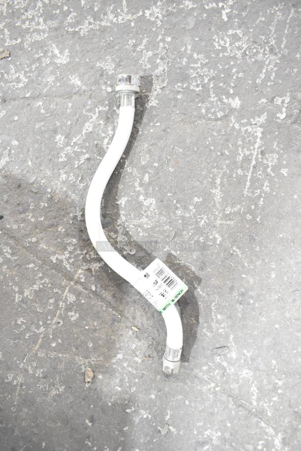 White flexible extension hose with metal connectors, labeled "NSF 350 PSI" and "Lead-Free," on textured surface.