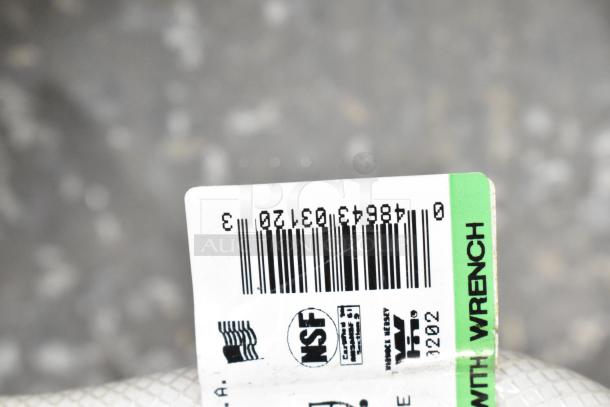 Barcode label on various lot items including brackets, lid, extension tubes, and hose. Marked with NSF certification.