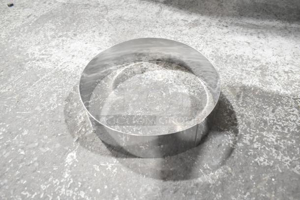 Lot of various items including metal bracket ring; good condition, reflective surface.