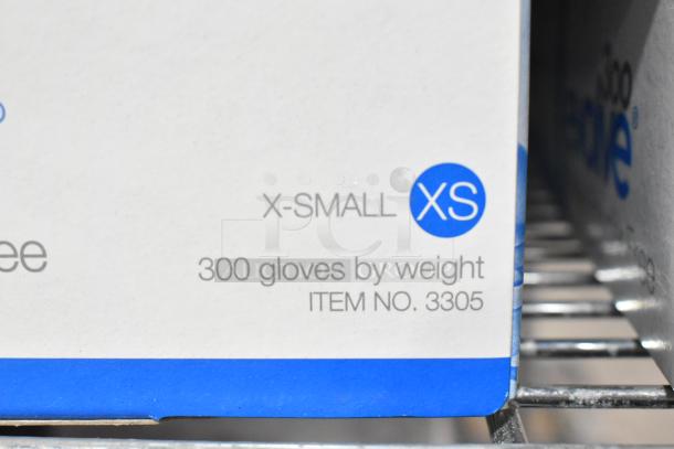 8 boxes of Cranberry Evolve 300 Nitrile Examination Gloves, size X-Small, item no. 3305, powder-free, new condition.