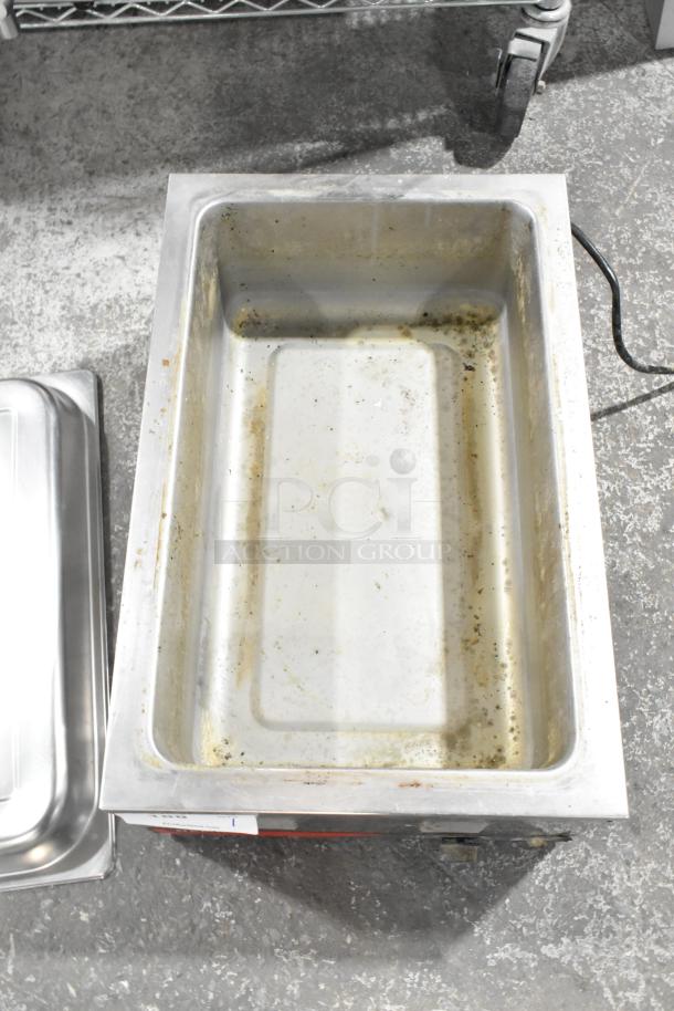 Nemco 6055A Commercial Countertop Food Warmer, visible wear. 120 Volts, 1 Phase. Stainless steel construction.