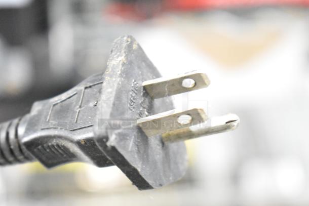 Close-up of a plug for the Glenray 102180 Commercial Countertop Soup Kettle, 120 volts, 1 phase.