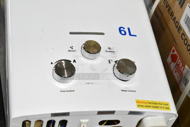 Ridgeyard Commercial Propane Gas Water Heater, 6L capacity, controls for fire and water, winter/summer settings, with safety warning label.