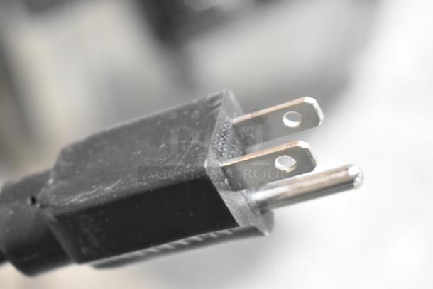 Close-up of a power plug for the Vevor YKF-8218T soft serve ice cream machine, 110 volts, 1 phase.