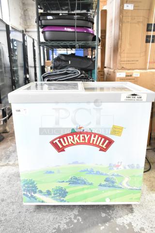 Arctic Air ST07G2 commercial chest freezer merchandiser, 115 volts, 1 phase. Features "Turkey Hill" branding.