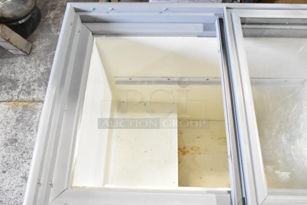 Arctic Air ST07G2 Commercial Chest Freezer, visible interior with clean, spacious white compartment. 115 Volts, 1 Phase.