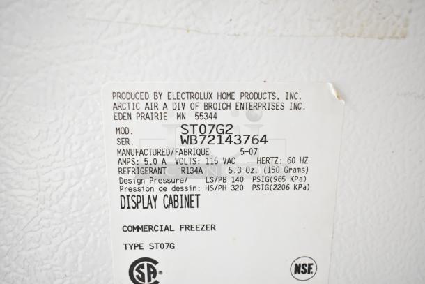 Arctic Air ST07G2 chest freezer label, 115V, 1 phase, R134A refrigerant, serial WB72143764, 5.0A, for commercial use.