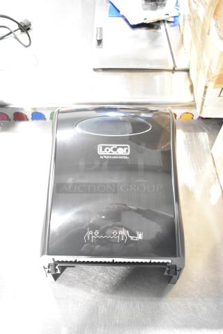 BRAND NEW LoCor D68006 wall mount dispenser with minor scratches. Black finish, Solaris Paper branding visible.