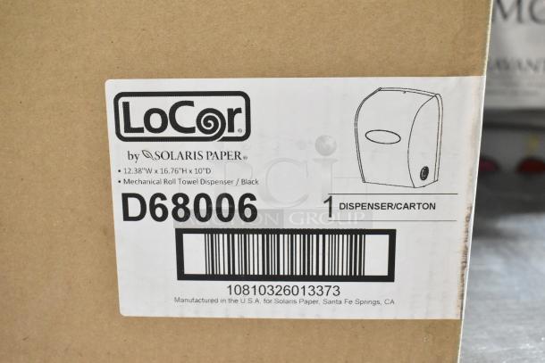 BRAND NEW LoCor D68006 Wall Mount Dispenser. Scratch and dent condition. Mechanical roll towel dispenser, black, 12.38"W x 16.76"H x 10"D.