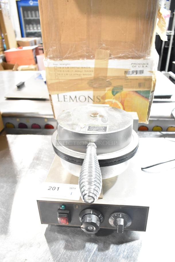 FLB613 Commercial Countertop Waffle Cone Maker, 110V, 2 Phase, with manual controls, metal housing, and caution label.